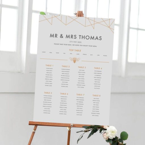 geometric table plan for weddings or special events copper and grey